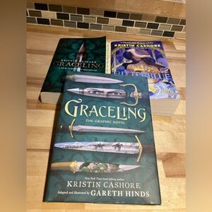 Three books from the Graceling series, inc a graphic novel, excellent condition
